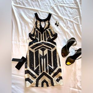 XXS black and nude sequence dress. Never worn, with tags attached.